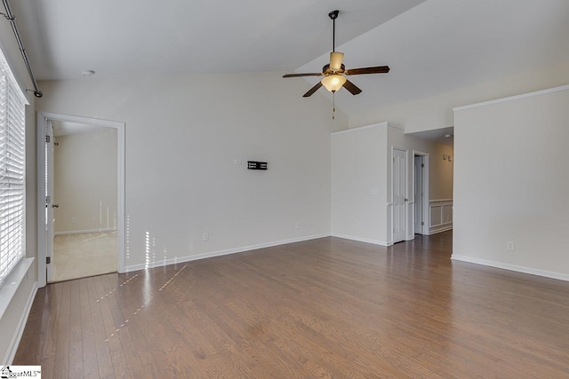 spare room featuring ceiling fan, dark hardwood / wood-style flooring, and high vaulted ceiling