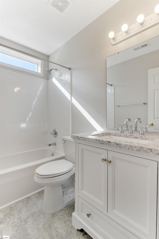 full bathroom with vanity, bathtub / shower combination, and toilet