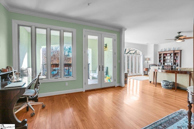 doorway to outside featuring ceiling fan, crown molding, light hardwood / wood-style flooring, and french doors