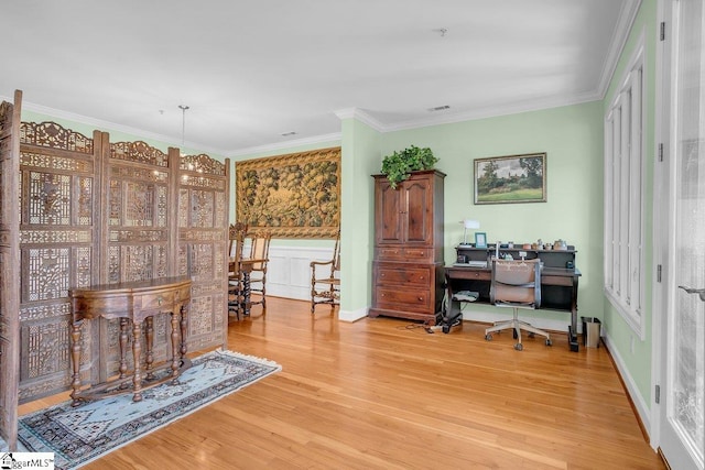 office featuring hardwood / wood-style floors, a notable chandelier, and crown molding