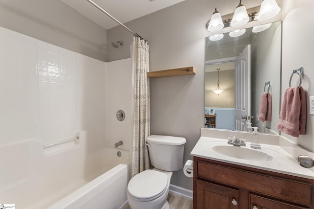 full bathroom featuring vanity, shower / tub combo, and toilet