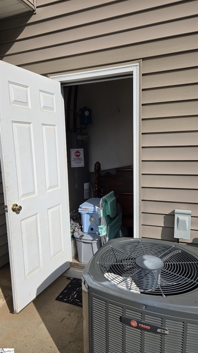 details featuring cooling unit and water heater