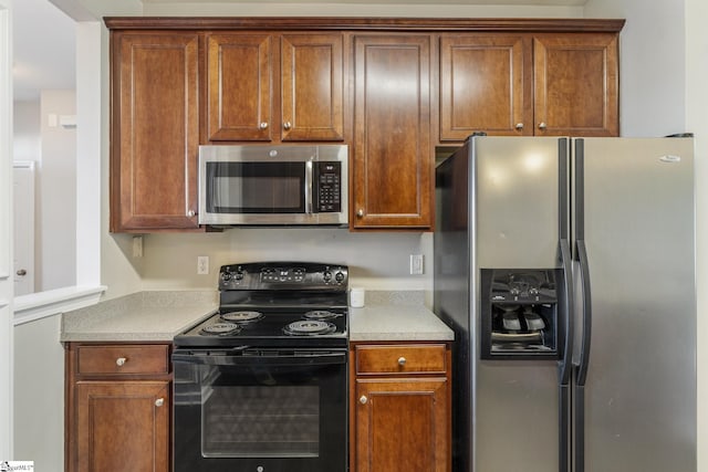 kitchen with appliances with stainless steel finishes