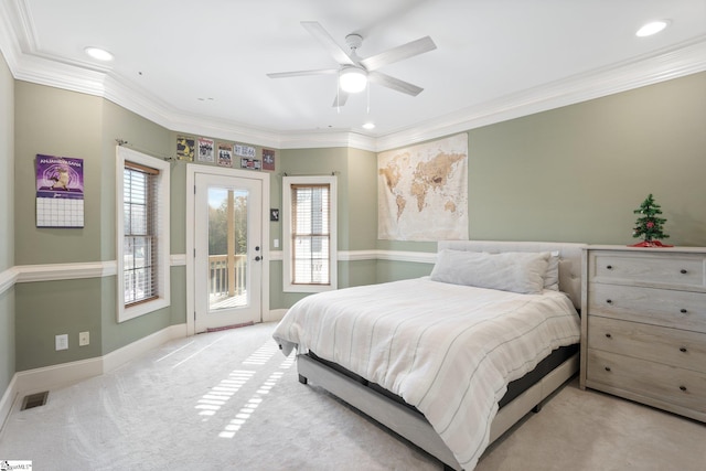 carpeted bedroom featuring access to exterior, ceiling fan, and crown molding