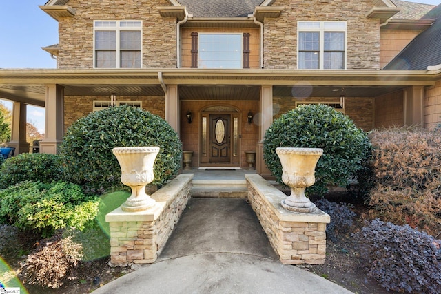 doorway to property with covered porch