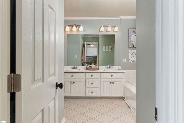 bathroom with tile patterned floors, vanity, and crown molding