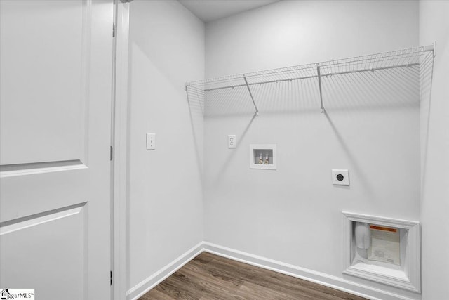 clothes washing area with washer hookup, dark hardwood / wood-style flooring, and electric dryer hookup