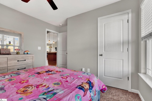 bedroom featuring ceiling fan and carpet floors