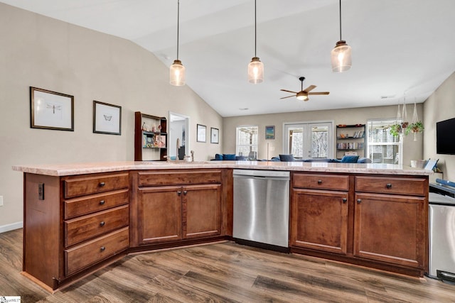 kitchen featuring dishwasher, dark hardwood / wood-style floors, and a wealth of natural light