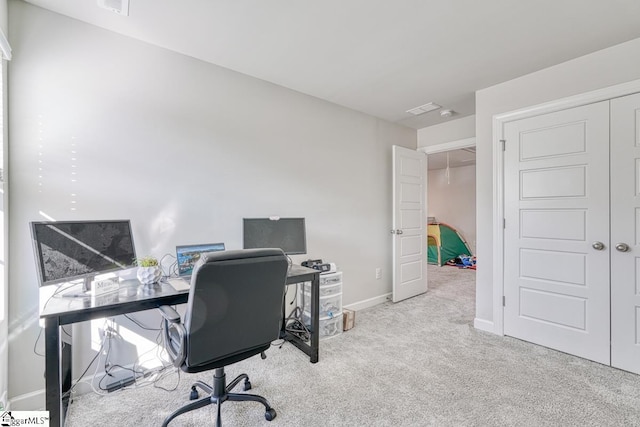 home office with light colored carpet