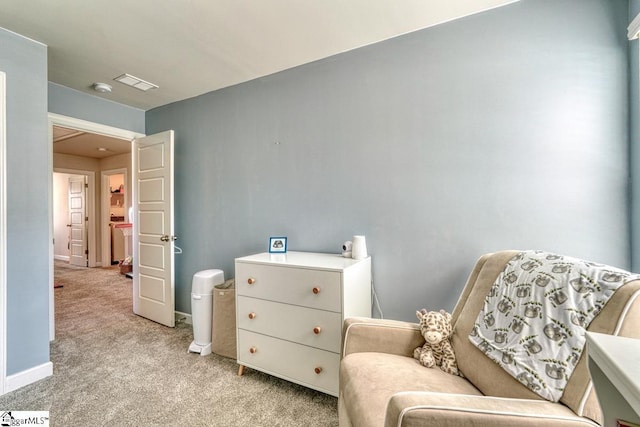 sitting room with light carpet