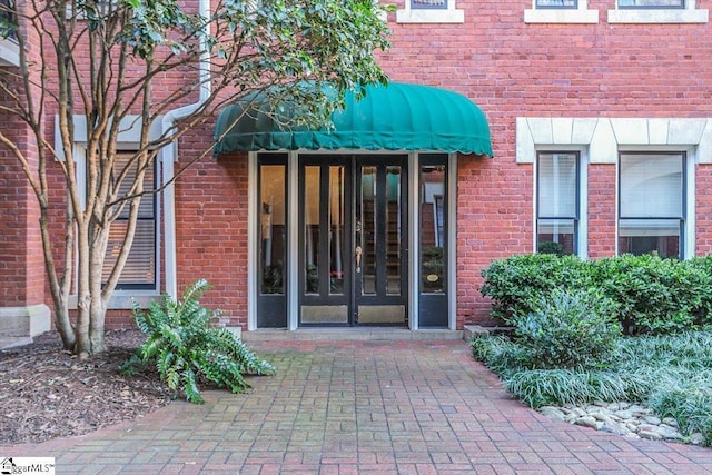 doorway to property with french doors