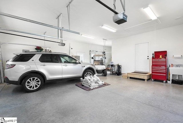 garage featuring a garage door opener