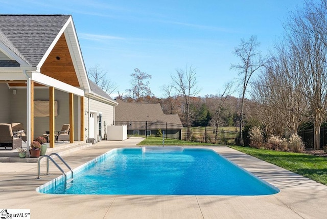 view of swimming pool featuring a patio