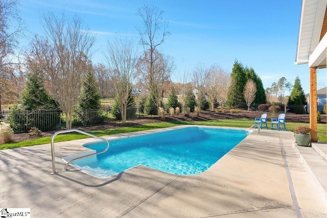 view of swimming pool featuring a patio area