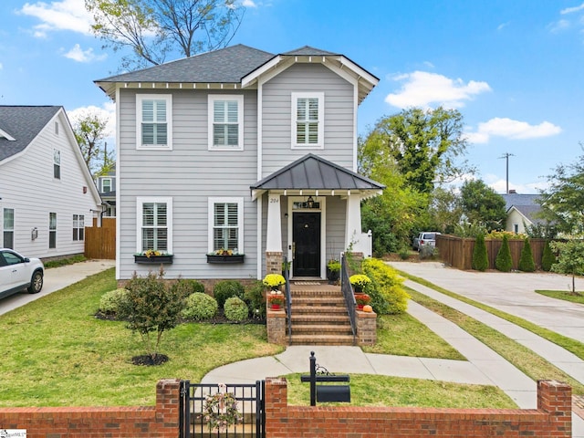 view of front facade with a front lawn