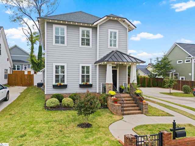 view of front of home featuring a front yard