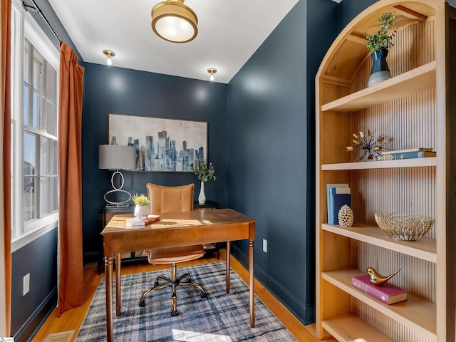 office space featuring hardwood / wood-style flooring