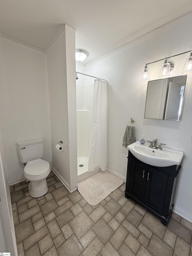 bathroom featuring a shower with curtain, toilet, crown molding, and vanity