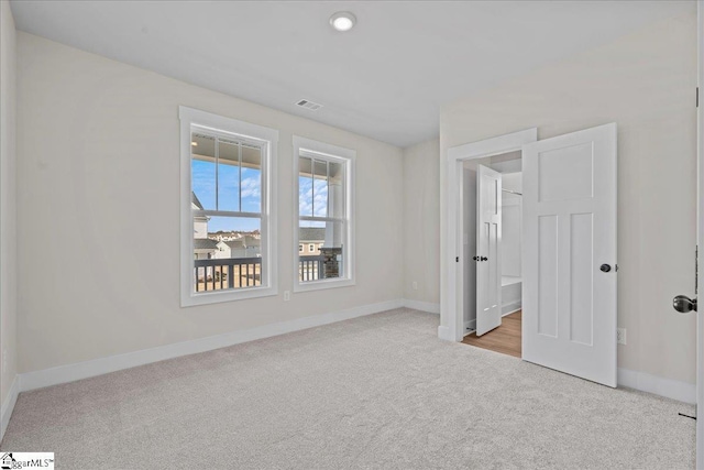 view of carpeted spare room