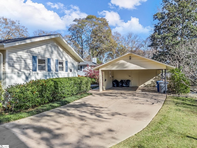 view of home's exterior featuring a carport