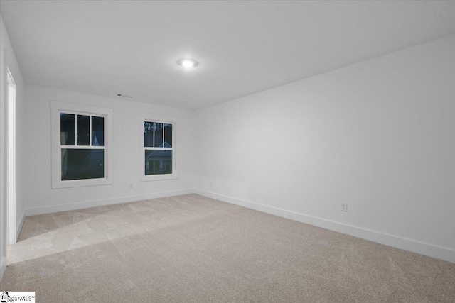 view of carpeted spare room