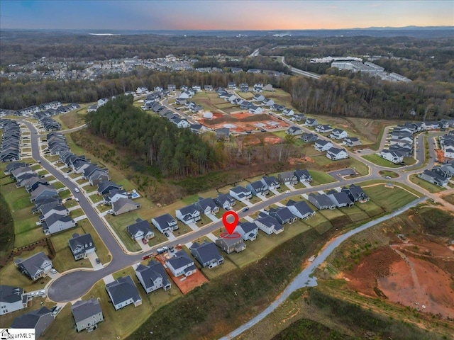 view of aerial view at dusk