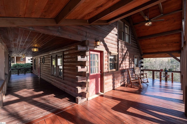 wooden deck with ceiling fan and covered porch