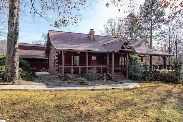 view of front of house with covered porch and a front lawn