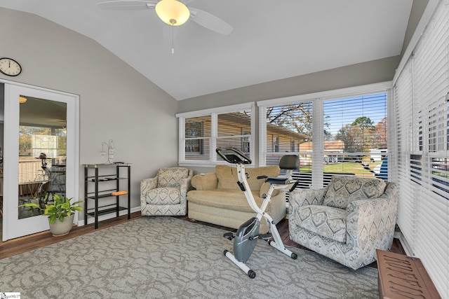 sunroom / solarium featuring vaulted ceiling, a wealth of natural light, and ceiling fan