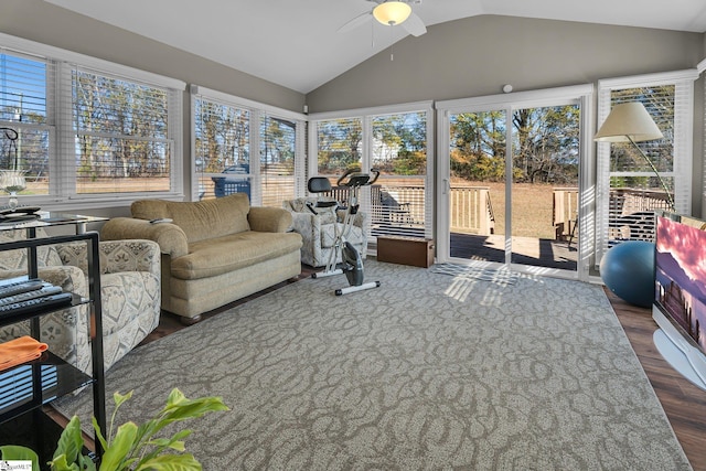 sunroom / solarium featuring ceiling fan and vaulted ceiling