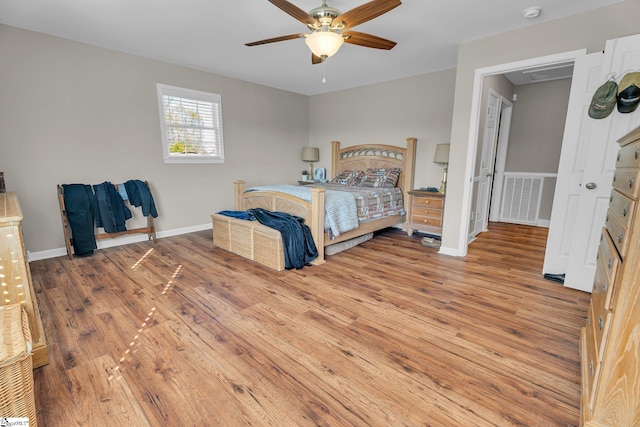 bedroom featuring ceiling fan and hardwood / wood-style floors