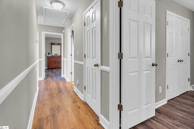 corridor featuring dark hardwood / wood-style floors