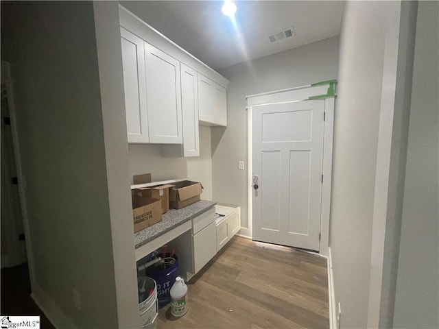 interior space with light hardwood / wood-style flooring