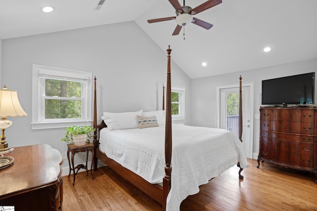 bedroom featuring access to exterior, ceiling fan, light hardwood / wood-style flooring, and vaulted ceiling