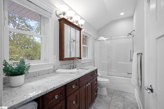 full bathroom with vanity, tile patterned floors, bath / shower combo with glass door, vaulted ceiling, and toilet