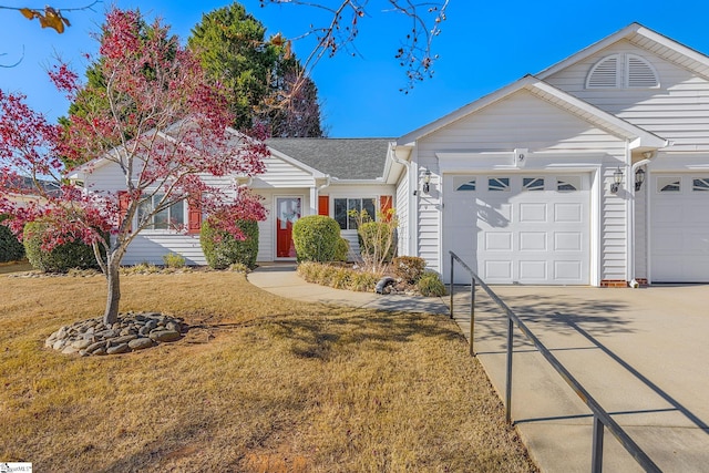 single story home with a garage and a front lawn