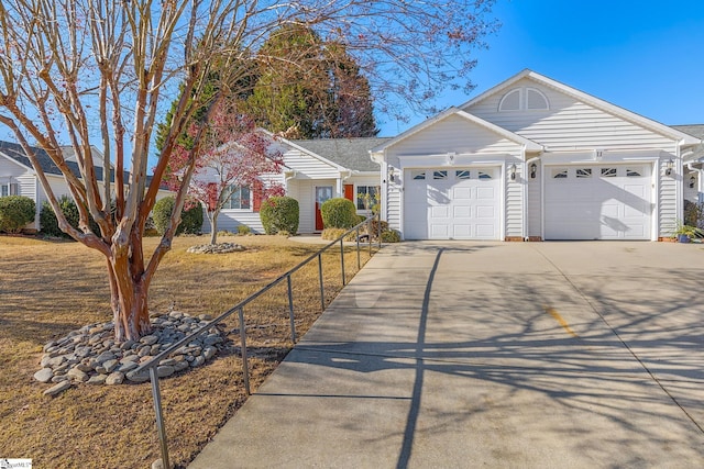 single story home featuring a garage