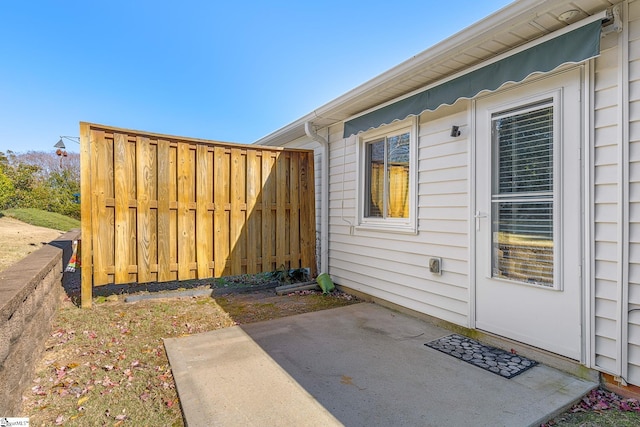 doorway to property featuring a patio