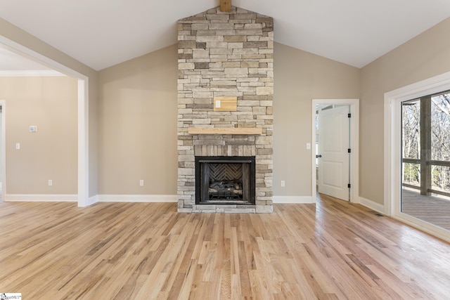 unfurnished living room featuring high vaulted ceiling, a fireplace, light wood-style flooring, and baseboards