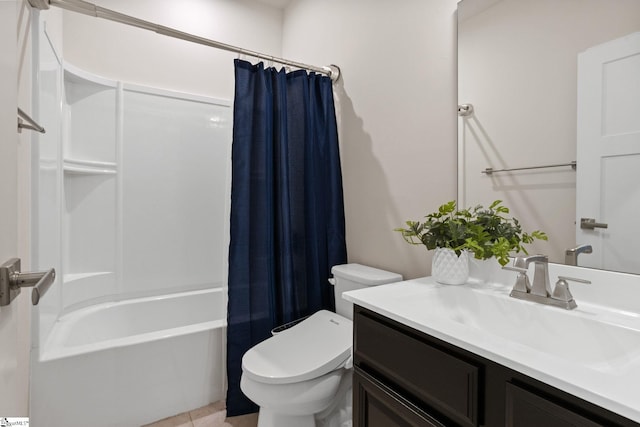 full bathroom with vanity, toilet, and shower / tub combo