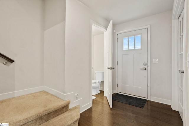 foyer featuring dark wood-type flooring