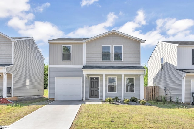 view of front facade featuring a front yard and a garage