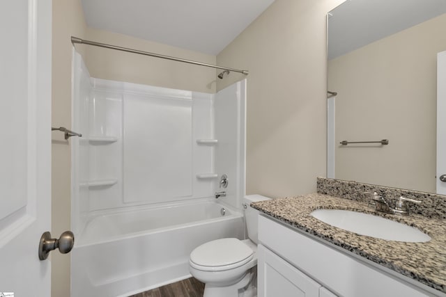 full bathroom with vanity, wood-type flooring, bathtub / shower combination, and toilet