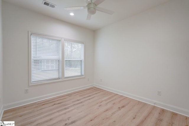 unfurnished room featuring light hardwood / wood-style flooring and ceiling fan