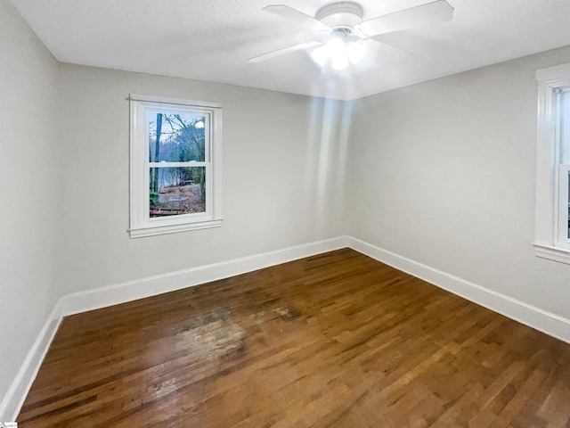 unfurnished room featuring ceiling fan and hardwood / wood-style floors