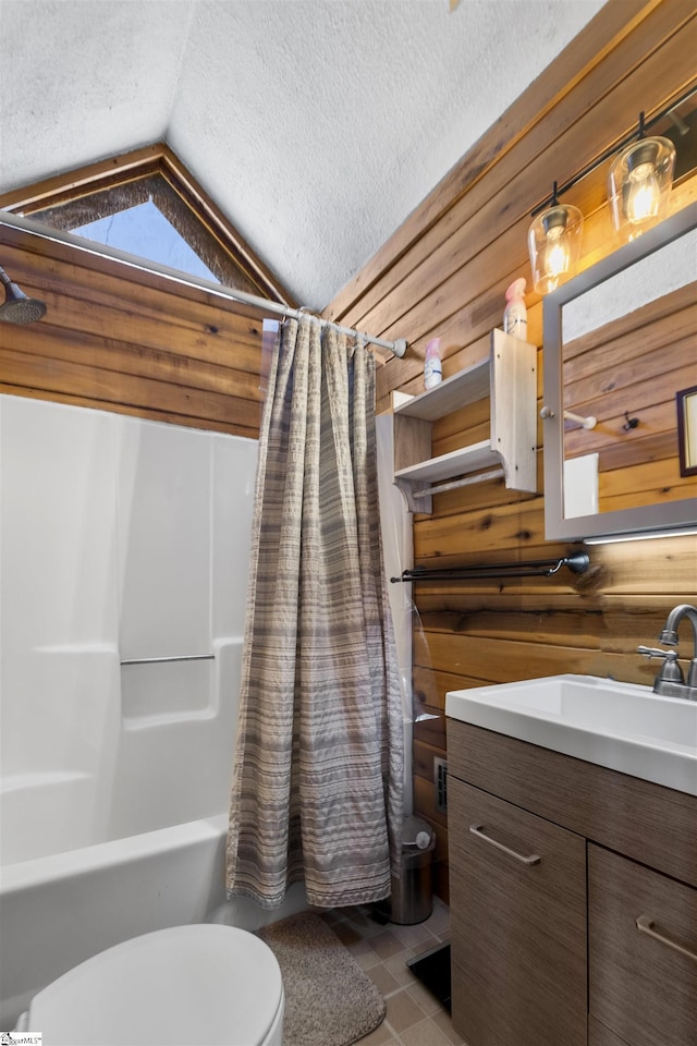 full bathroom with shower / bath combination with curtain, wood walls, toilet, and vaulted ceiling