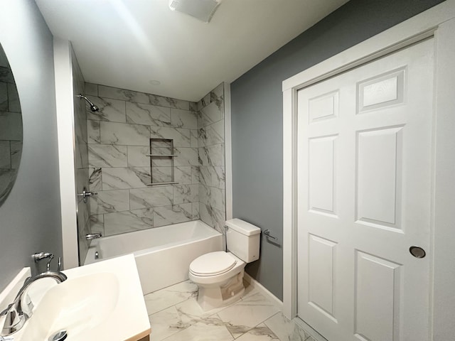 full bathroom featuring sink, tiled shower / bath combo, and toilet