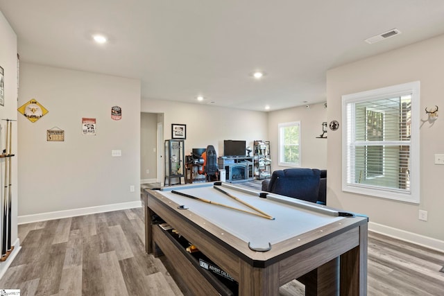 playroom with light wood-type flooring and billiards