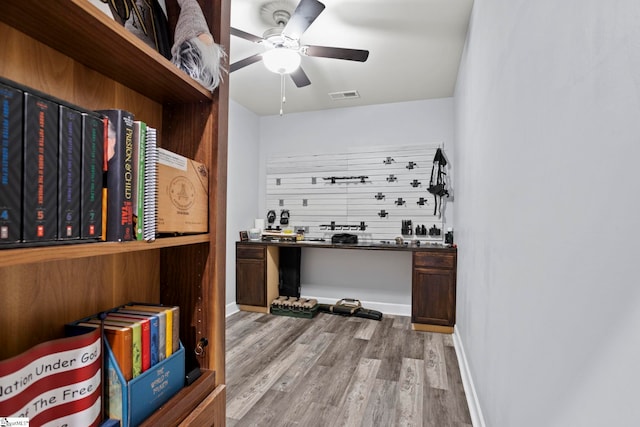 interior space with ceiling fan and light wood-type flooring